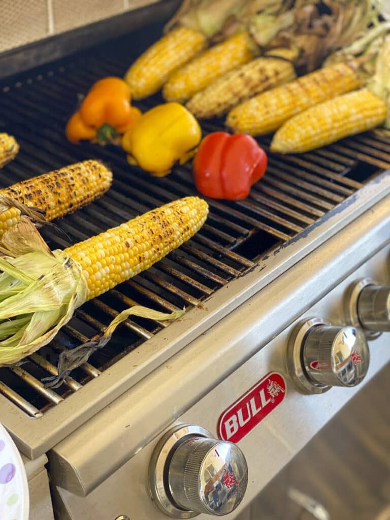 Corn and bell peppers grilling on a Bull Grill