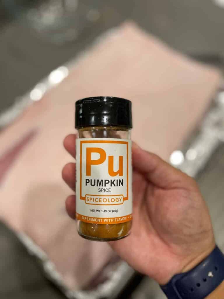 Chef Anthony holding spiceology pumpkin pie spice