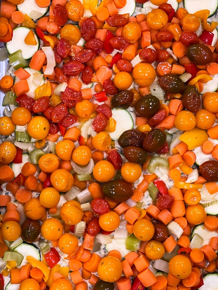 veggies tossed with avocado oil and ready to be roasted to make Easy (Almost) Vegetarian Southwestern Lasagna
