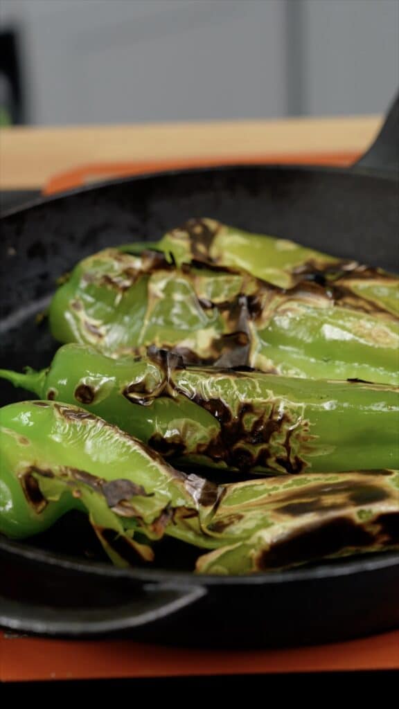 Green chiles cooked on cast iron